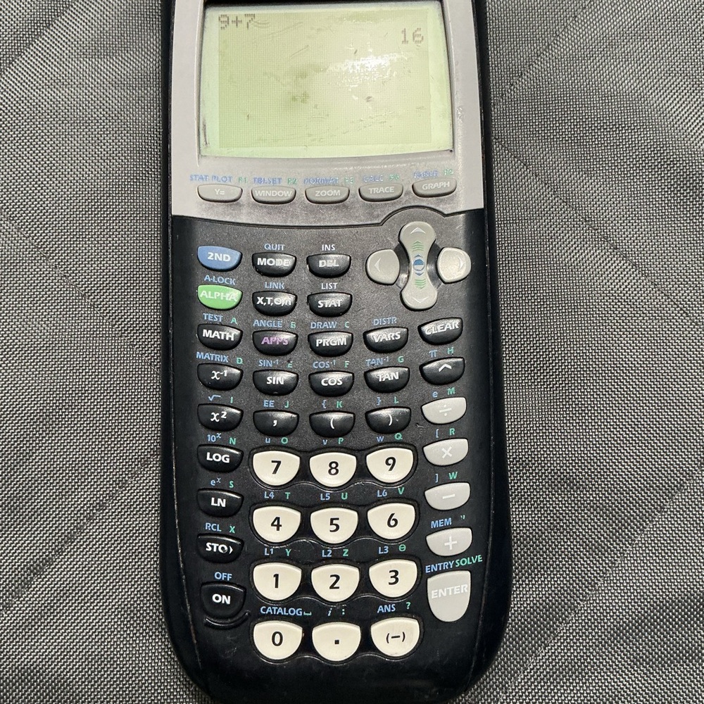 Texas Instruments TI - 84 B Plus Graphing Calculator with Battery Compartment